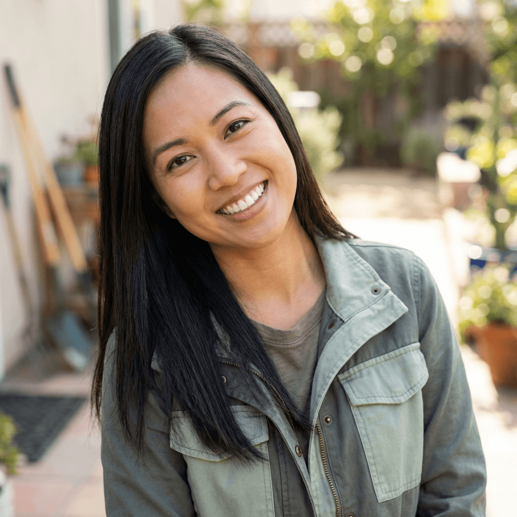 Sarah Mitchell in a casual sweater smiling in natural light